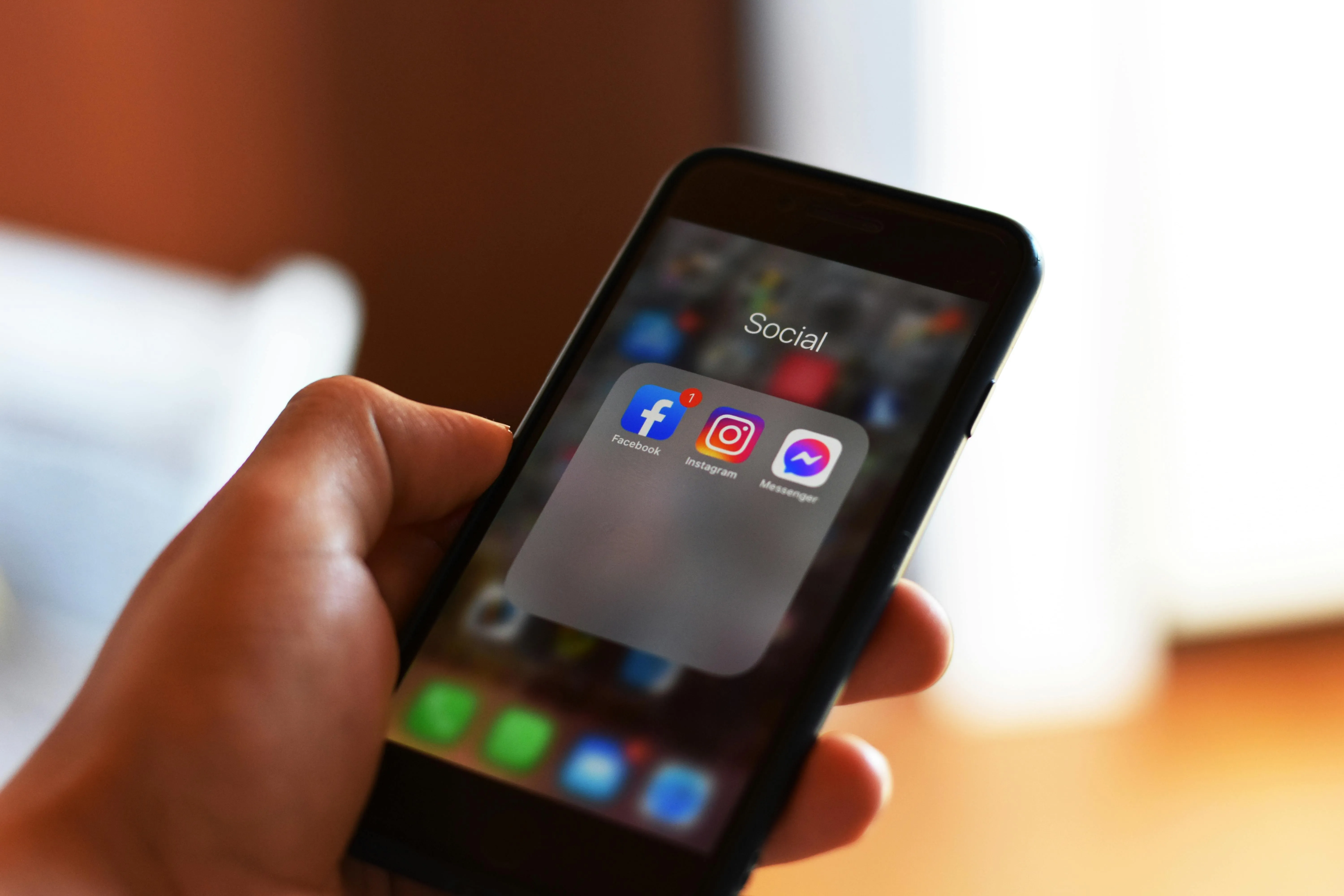 A phone showing an Instagram feed managed for a Miami business